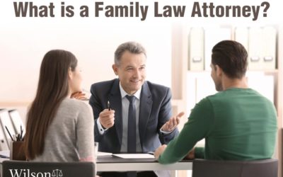 A couple talking to a family law attorney
